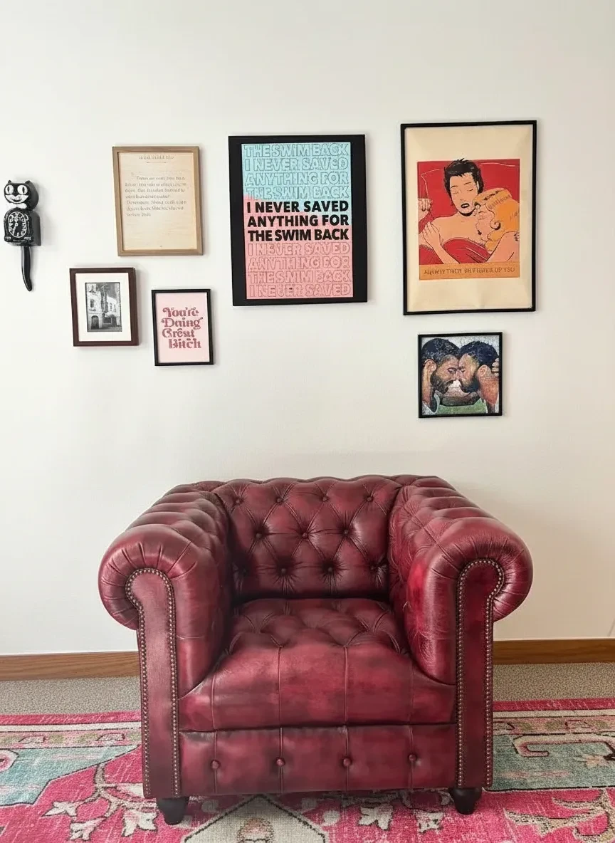 Love Psychotherapy office — burgundy Chesterfield chair and gallery wall